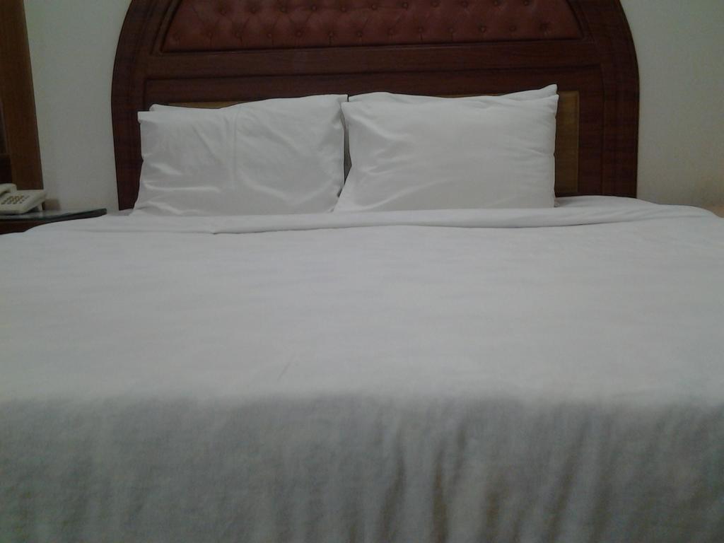 Hotel Afford Inn Dháka Pokoj fotografie