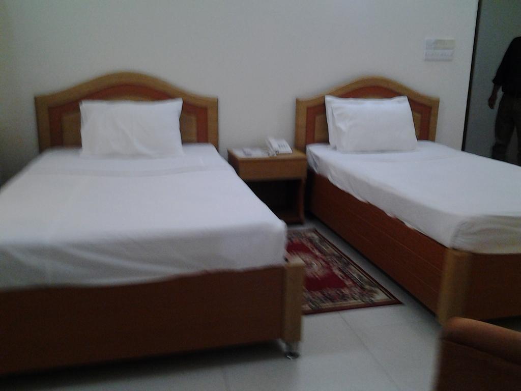 Hotel Afford Inn Dháka Pokoj fotografie